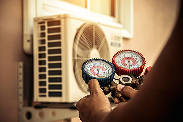 Professional Air Conditioning Service technician working in Sylacauga, AL